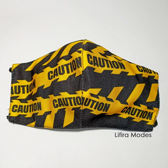 MASKER PRINTING KATUN MOTIF CAUTION